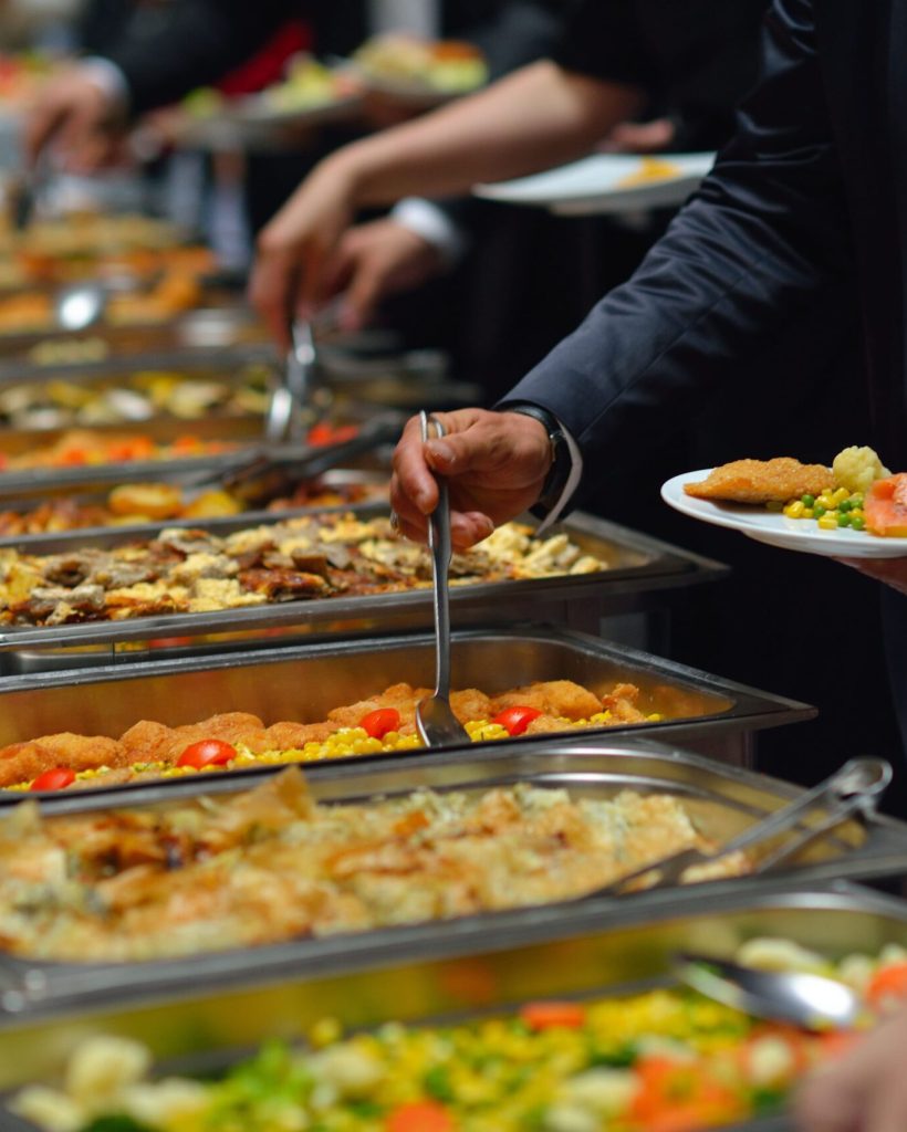 people-group-catering-buffet-food-indoor-luxury-restaurant-with-meat-colorful-fruits-vegetables